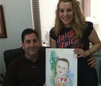 Billy and Aleka avec le portrait de leur bébé Maria